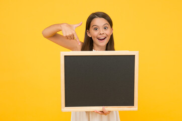 fashion and beauty. childhood happiness. happy childrens day. blackboard for copy space. summer activity in camp. vacation announcement for kid. small girl wear straw beach hat