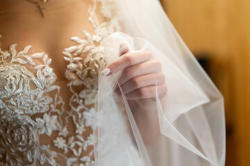 close up of the bride in a wedding dress
