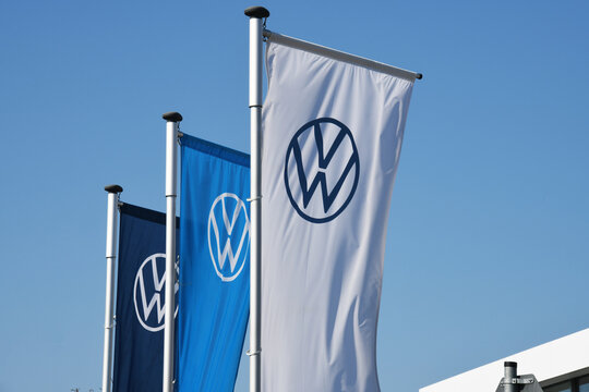 Hanover, Lower Saxony / Germany - April 5, 2020: Flags with the new logo of AG in Hanover, Germany -is one of the world's leading manufacturers of automobiles