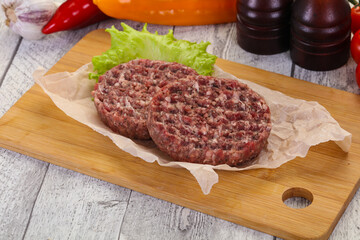 Raw burger cutlet