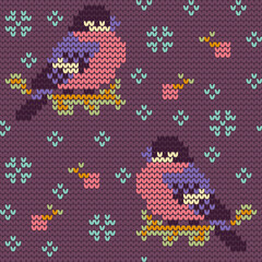 Jacquard knitted seamless pattern with cute bullfinchies, rowanberries and snowflakes. Winter background with nature and birds. Scandinavian style. Vector illustration.