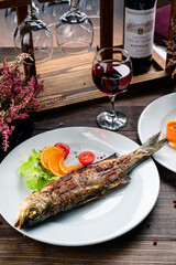 sea bass grilled with salad