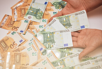 Euro banknotes in female hand. Euro cash background of money