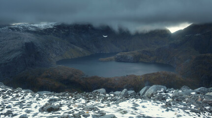 alpine lake in gloomy cloudy weather in norway Lofoten islands, mount Munkan