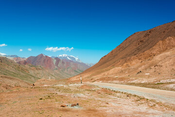 Fototapeta na wymiar Kyzylart Pass (4280m) on The Pamir Highway (M41 Highway) in border of Kygyzstan - Tajikistan, Pamir mountains.