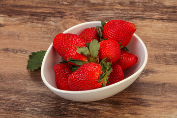 Ripe sweet strawberry with leaf
