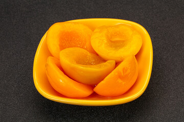 Marinated peaches fruit in the bowl