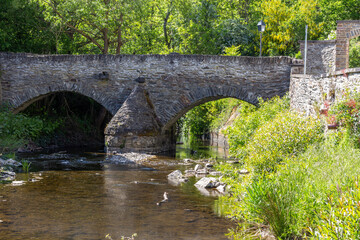Historic stone bridge over river Elz in Monreal