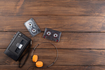Music concept. Cassette tape player and headphones.Vintage tape recorder