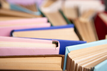 Books background for wisdom, science and education. Reading and writing concept