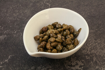 Tasty capers in the bowl