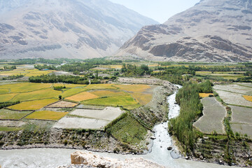 Afghanistan Village at Wakhan Valley View from Khaakha Fortress in Ishkashim, Gorno-Badakhshan, Tajikistan. It is located in the Tajikistan and Afghanistan border.