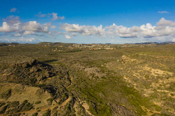 Aerial view of coast of Curaçao in Caribbean Sea with turquoise water, cliff and beautiful coral...