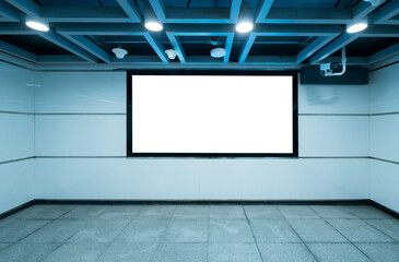 blank billboard in the underground, poster template. Shot in the metro station in the city center