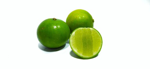 lime slides on a white background with a wooden support