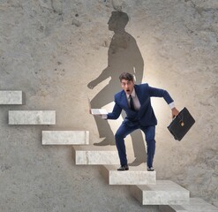 Businessman and his shadow in business concept