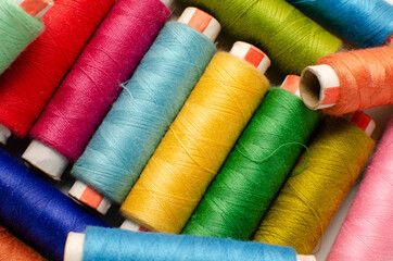 Multicolor sewing thread roll background