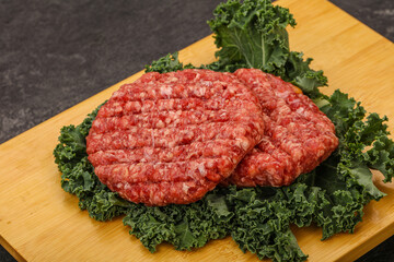 Raw beef burger cutlet for cooking