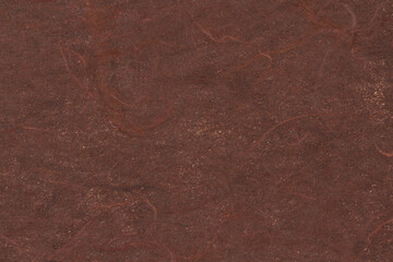 Brown textured cardstock paper closeup background