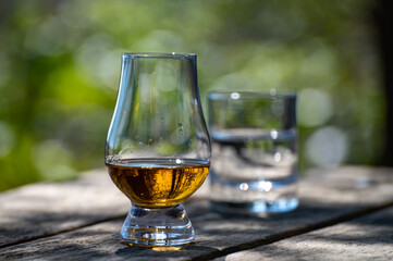 Tasting of scotch single malt whisky from Islay island, most intensely flavoured of all whiskies in Scotland