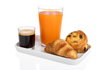 French breakfast, coffee, orange juice, croissant and raisin bread on white background
