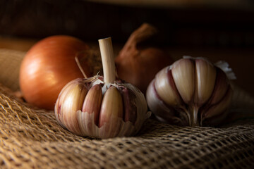 A beautiful arrangement with garlic and onion under natural light