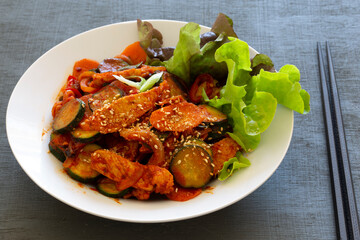 Stir fried with pork and vegetables sprinkle sesame seeds