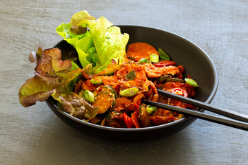 Stir fried with pork and vegetables sprinkle sesame seeds