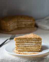 Slice of layered honey cake.