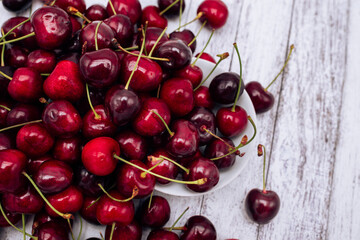 Ripe red cherries in bulk