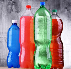 Plastic bottles of assorted carbonated soft drinks