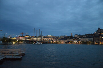 Naklejka premium old town stockholm sunset water
