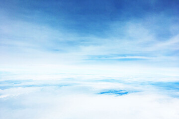 Naklejka na ściany i meble landscape view of sky above cloud in day when travel by plane and look out from window of plane