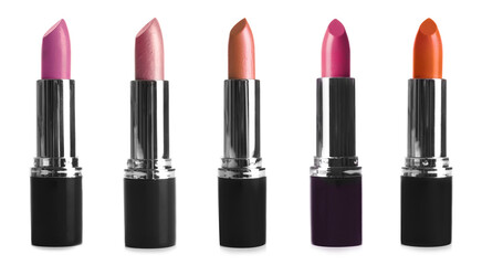 Fototapeta premium Set with different lipsticks on white background