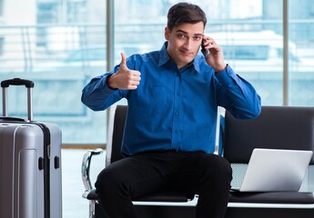 Man wairing to boarding in airport lounge room