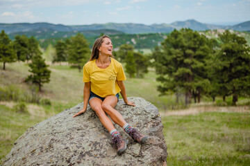 Naklejka premium young woman in the mountains