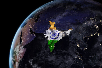 Map of India with embedded national flag at night from space. The surface of the planet and the visible lights of cities. Image elements courtesy of NASA. 3D illustration