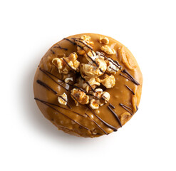Donut topped with caramel. Isolated on white background. top view.