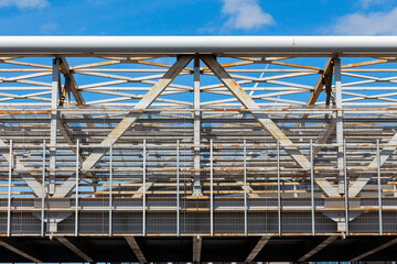 Metal pedestrian transit passage in the form of a bridge