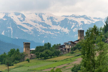 Ancient towers with Caucasus Mountains in Mestia, Samegrelo-Zemo Svaneti, Georgia.