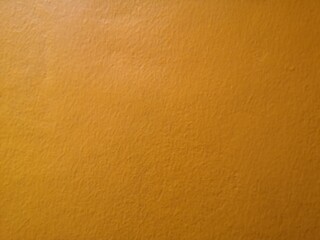 brown leather texture​ cement​ wall​ rough​ surface​ texture​ material​ for​ background, yellow color