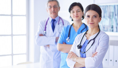 Fototapeta premium Group of doctors and nurses standing in the hospital Accident and Emergency department
