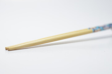 Close-Up Of Chopsticks on isolated white background