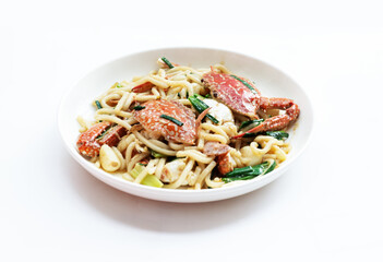 Fried noodles with sea crab on the plate