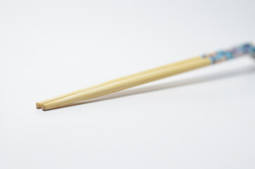 Close-Up Of Chopsticks on isolated white background