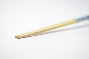 Close-Up Of Chopsticks on isolated white background