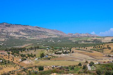 View of the slopes of the Atlas mountains against the blue sky. Morocco.