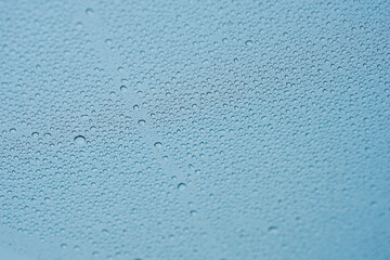 Natural background with water drops on the glass