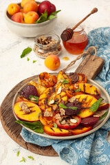 Grilled salad with summer fruits.