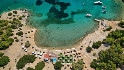 Aerial drone photo of secluded paradise bay and small island of Moni with turquoise crystal clear...
